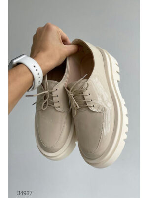 Кожаные лоферы со шнуровкой на плоской массивной подошве