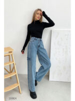 Расклешенные джинсы с рваной отделкой