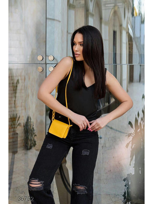 Свободные джинсы со рваной отделкой — изображение 3