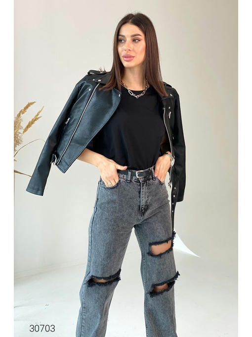 Расклешенные джинсы с рваными разрезами — изображение 4