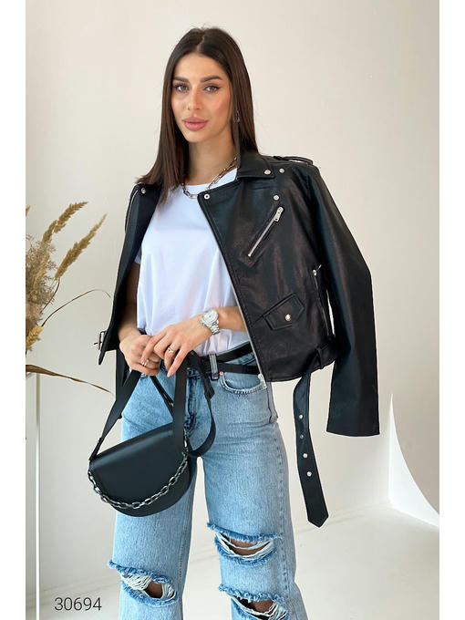 Расклешенные джинсы с рваными разрезами — изображение 4