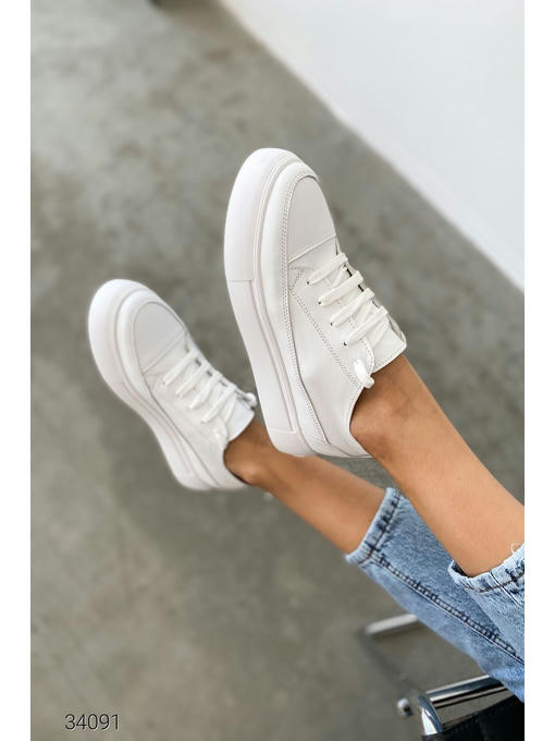 Кожаные кеды на высокой подошве — изображение 4